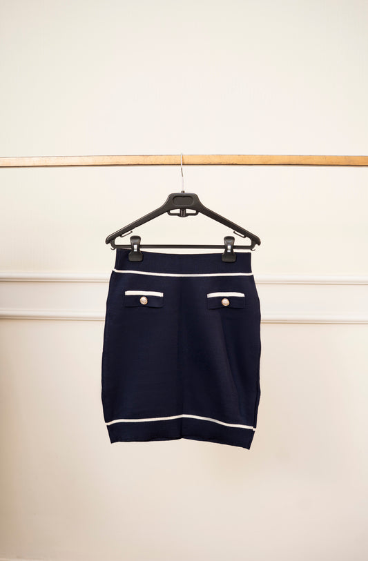 Navy trim matching skirt